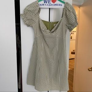Green gingham mini dress.